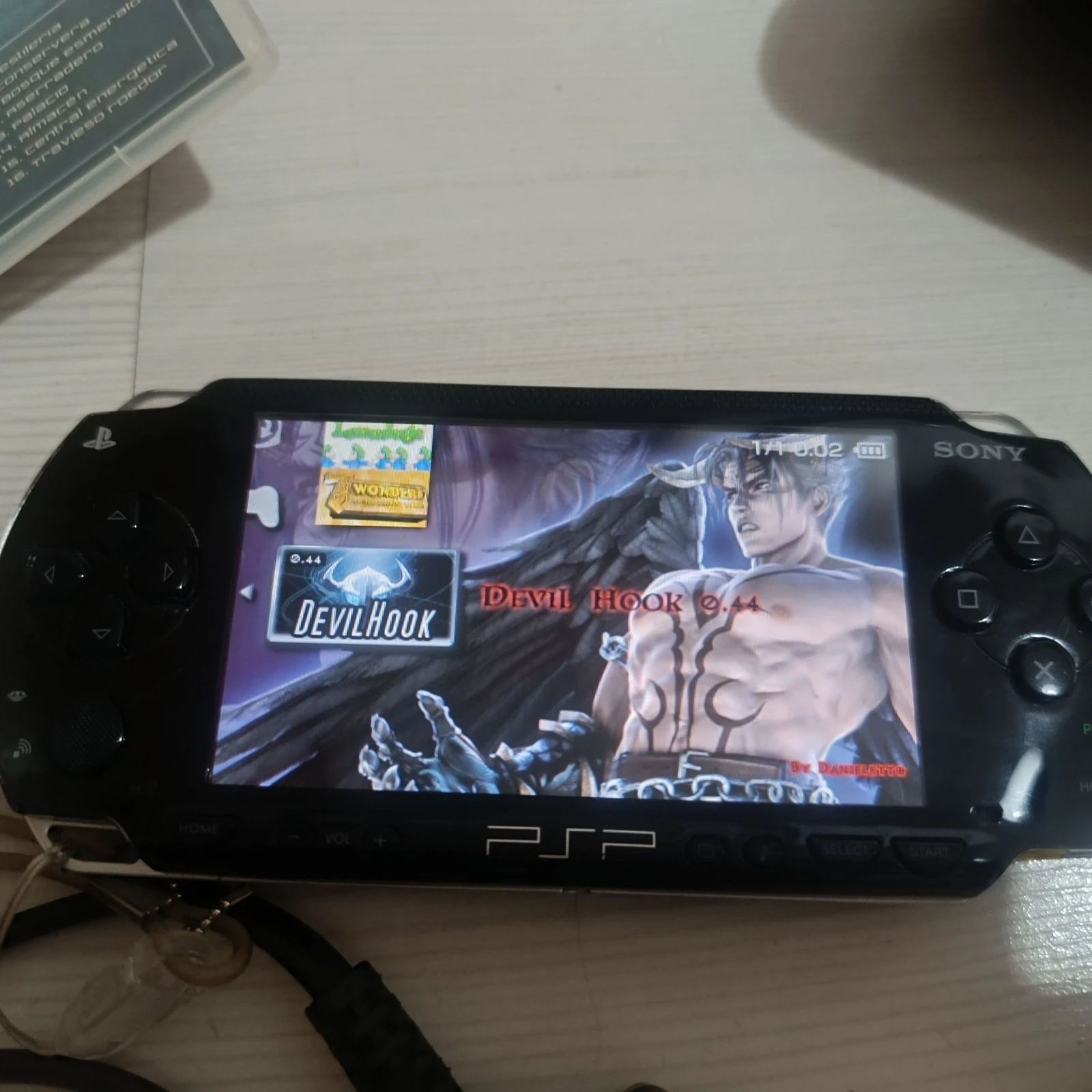 Pack Sony PSP + étui rigide + chargeur d'origine + carte 2 Go + 5 jeux – photo 5